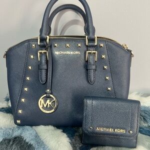 Michael Kors pose and wallet